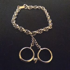 Alice Caviness signed ring charm bracelet
